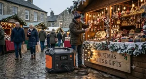 Compact power station illuminating a evening Christmas market stall in the UK.